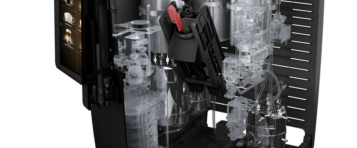 Technician repairing a coffee machine with electric drill